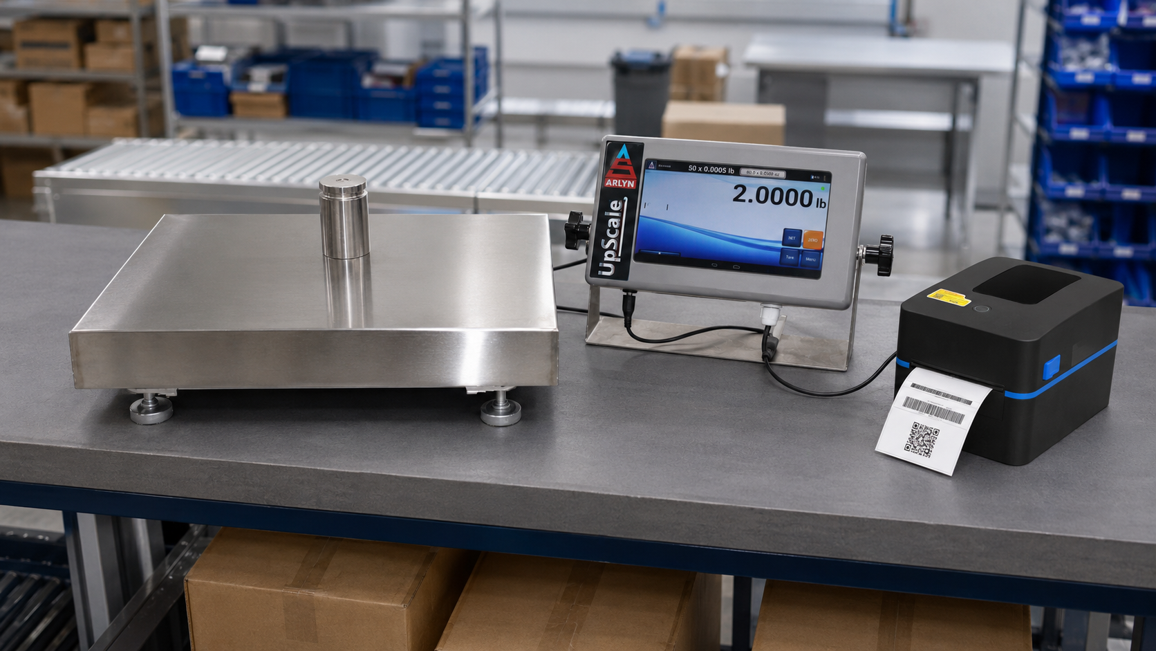 Arlyn stainless steel platform scale with UpScale touchscreen and A90-style barcode label printer at an industrial workstation
